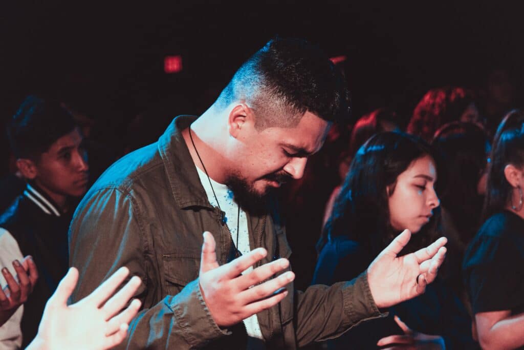 Group Prayer With Closed Eyes