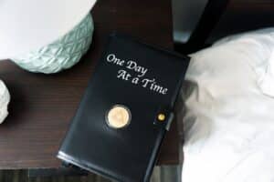 A devotional on a bedside table at our Christian rehab for women