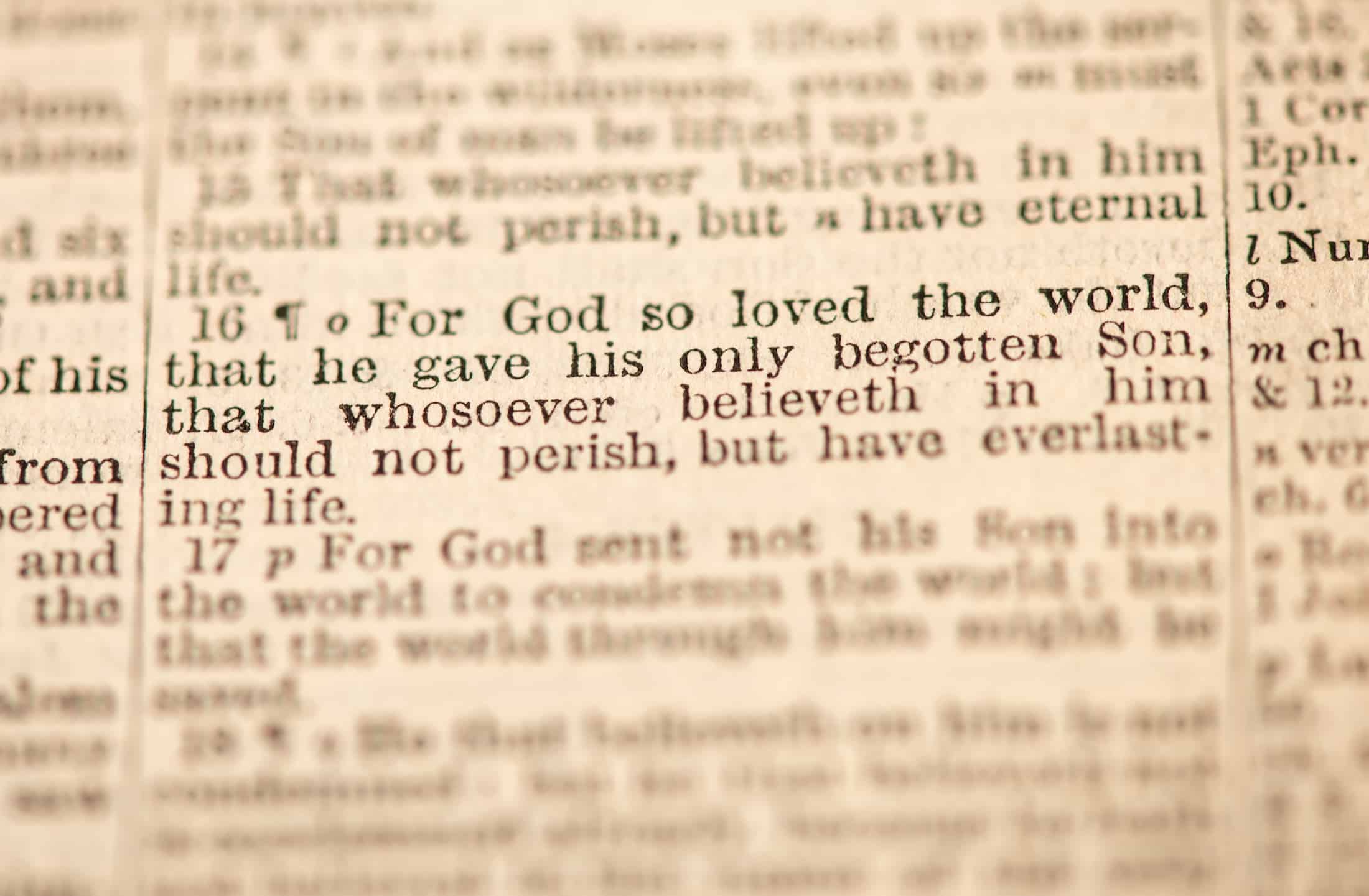 A close-up of John 3:16, one of the top Bible verses for addicts