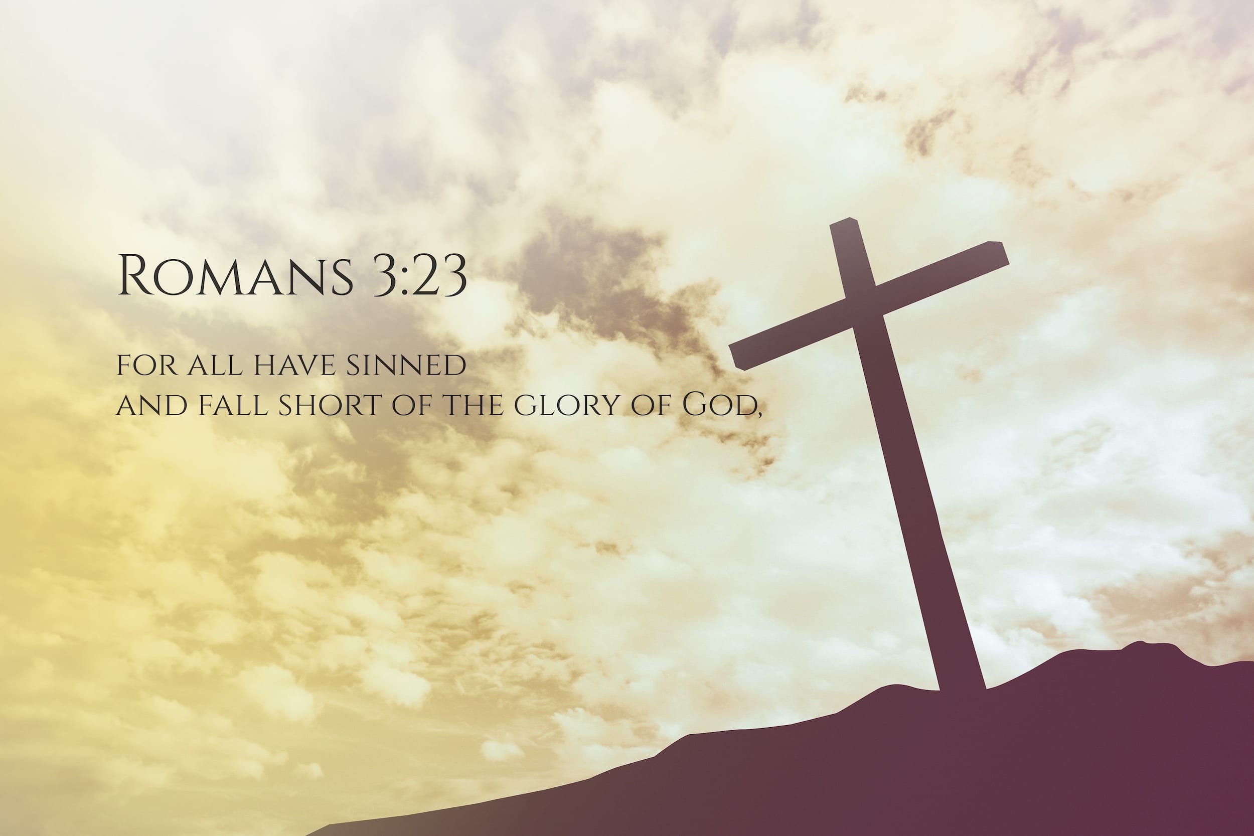 How the Bible differs from the spiritual principles of Alcoholics Anonymous, as symbolized by a photo of a cross and Romans 3:23