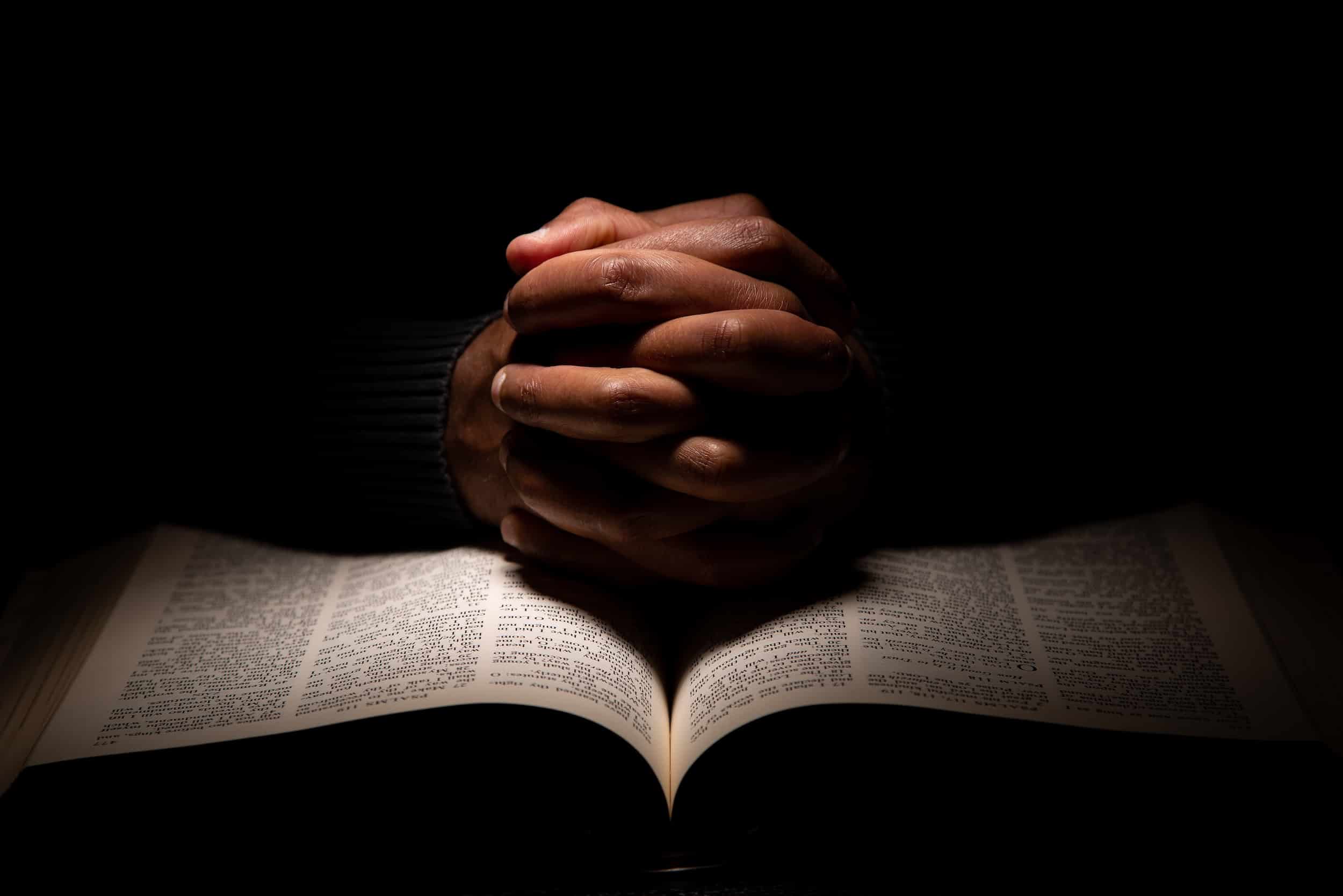 Photo of someone praying for sobriety